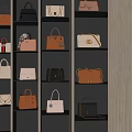 Elegant Handbags Display On Illuminated Shelves With Various Styles And Colors