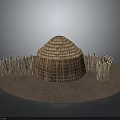 Traditional Thatched Hut Structure With Round Roof Wooden Fences On Earthen Ground