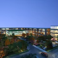 Aerial View Planning of Modern Commercial Complex with Glass Facades Landscaped Gardens and Parking Area