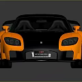 Two Tone Orange Black Sports Car With Sleek Aerodynamic Design And Rear Spoiler