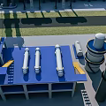 Modern Industrial Equipment Setup With Blue Platform White Cylindrical Tanks Pipes and Industrial Towers