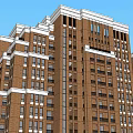 Modern High Rise Residential Building With Brown Exterior And Light Colored Base
