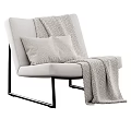 Light Colored Modern Accent Chair with Soft Pillow Striped Blanket and Black Metal Legs