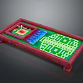 Colorful Household Tray With Divided Sections In Various Colors And Small White Object On Top