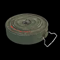 Vintage Military Weapon TM-46 Green Circular Mine With Rusty Surface And Metal Chain