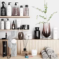 Modern Bathroom Accessories On Shelves With Bottles Jars And Towels