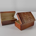 Decorative Wooden Box With Intricate Carved Patterns And Golden Accents