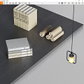 Neatly Stacked Books And Magazines On Dark Wooden Table With Scrolls And Hanging Lamp