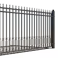 Black Metal Fence With Decorative Spiked Top And Curved Patterns In Rural Field