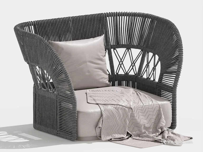 Curved Dark Woven Rattan Single Seater Sofa With Light Cushion And Throw Blanket 3d model 