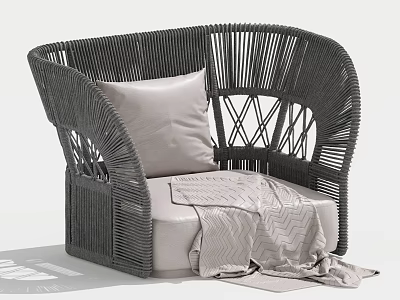 Curved Dark Woven Rattan Single Seater Sofa With Light Cushion And Throw Blanket 3d model