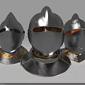 Three Medieval Metal Knight Helmets With Spiked Tops Gold Trim And Rivets
