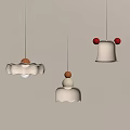 Three Modern Pendant Lights with White Ceramic Bodies and Red Brown Decorative Balls