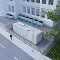 Outdoor Industrial Equipment With Blue Units Near White Building With Fence And Container Structure