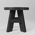 Black Wooden Stool With Round Seat And Cross Leg Design For Modern Home Interior