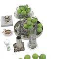 Fresh Green Limes in Glass Bowl with Metal Containers Glassware Caravaggio Book on Silver Trays