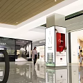 Modern Shopping Mall Lobby with Brand Stores Advertising Display Shiny Floor and People Walking