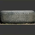 Old Tire With Deep Tread Pattern Placed On Grass And Leaves Platform 3d model