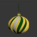 Shiny Green And Gold Striped Christmas Ornament With Hanger On Black Surface