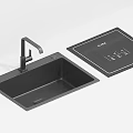 Stylish Black Kitchen Sink With Modern Faucet And Side Drainer Design