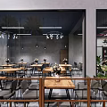 Modern Barbecue Restaurant Interior With Hanging Lights Wooden Tables And Green Plants