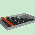Tray with Black Cylindrical Items Yellow Strip and White Section Arrangement
