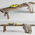 Wooden Public Bench with Yellow Fruits in Bowl and Light Cloth on Top