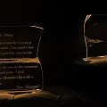 Crystal Table Lamp With Engraved Text And Unique Curved Design Illuminated In Dark Room