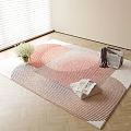 Square Rug With Pink Beige Gradient Pattern And White Flower Vase Magazine On Wooden Floor