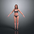 Woman in Black Bikini and Sandals with Arms Naturally Spread Standing Against Gray Background