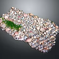 Natural Stone Pebbles With Various Colors And Small Green Grass In Center