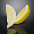 Two Fresh Juicy Lemon Slices on Black Background With Shiny Reflection