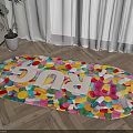 Vibrant Round Rug With Colorful Candy Patterns And RUG Lettering On Wooden Floor