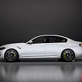 White Sports Sedan With Streamlined Body Black Alloy Wheels And Yellow Brake Calipers