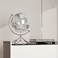 Modern Decorative Globe Ornament Set with Books on White Cabinet