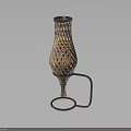 Green Plant In Modern Brown Hollow Out Vase With Metal Stand On Dark Background
