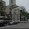 Modern Full View Glass Fashion Store Showcases Along Vibrant Downtown Commercial Shopping Street