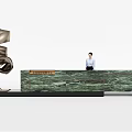 Elegant Green Marble Reception Desk with Textured Surface Abstract Sculpture and Receptionist