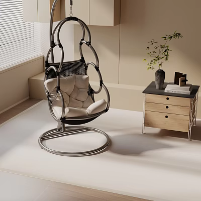 Hanging Rattan Leisure Chair with Cream Cushion Metal Frame Side Table Potted Plant and Books 3d model