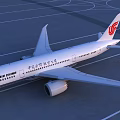 Air China Airliner Parked On Airport Runway With Red Logo And Branding