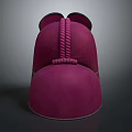 Purple Hat Shaped Sculpture With Symmetric Ear Like Structures And Spiral Decoration