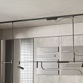 Linear Metal Pendant Light in Modern Minimalist Interior with Gray Geometric Wall Decor