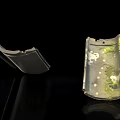 Old Roof Tiles With Moss Green And White Spots On Black Background