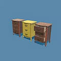 Three Stylish Wooden Chests of Drawers in Brown and Yellow on Blue