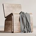 Wooden Textured Leisure Chair With Black And White Checkered Blanket In Modern Minimalist Design