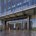 Modern Wyndham Hotel Building Facade With Glass Curtain Wall And Metal Framing Entrance
