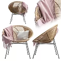 Rattan Outdoor Chair with Pink Blanket White Cushion and Black Metal Legs