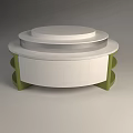 Circular Multi Tiered Display Shelf With White Surface And Green Supports For Product