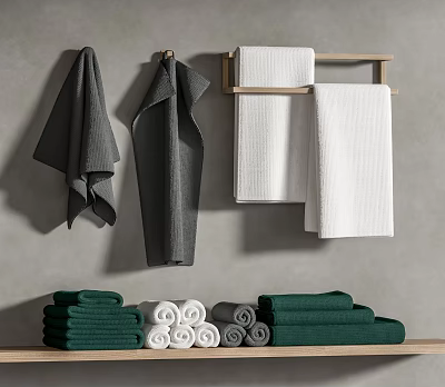 Soft Gray White And Green Towels Hanging On Wall And Folded On Wooden Shelf 3d model