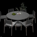 Modern Round Wooden Table And Six Chairs Set With Fruit Bowl And Green Plant